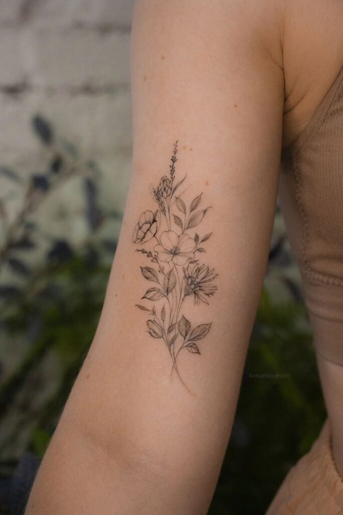 tatuagem no braço feminina cotovelo