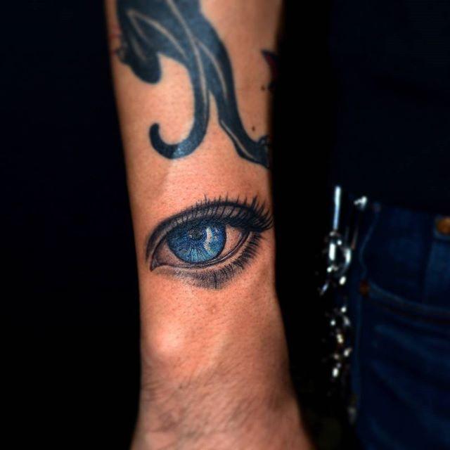 tatuagem de olho na mão